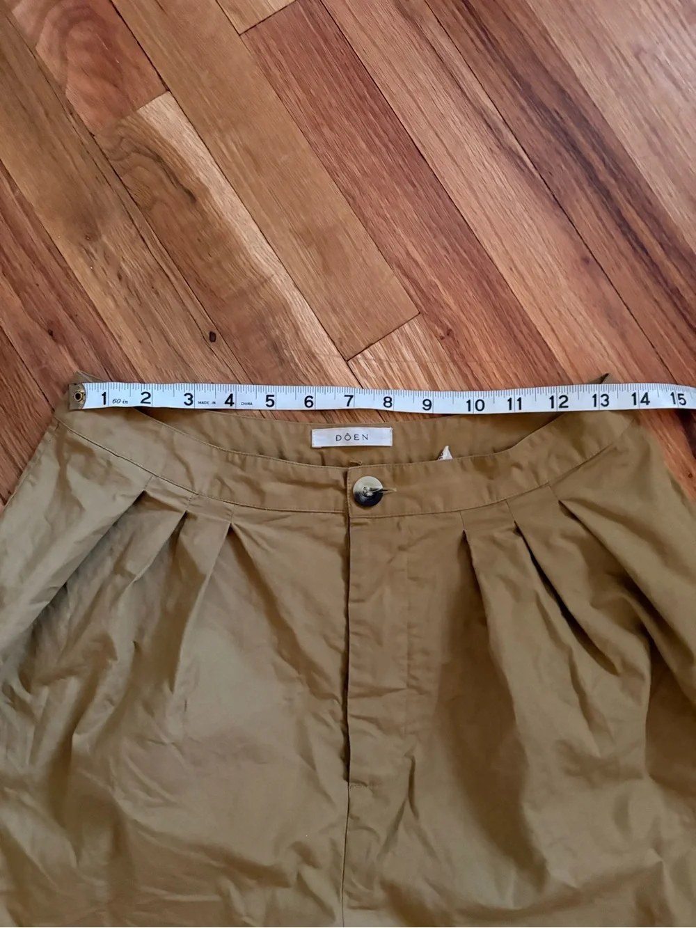 Doen High Waist Pleated Shorts in Mustard